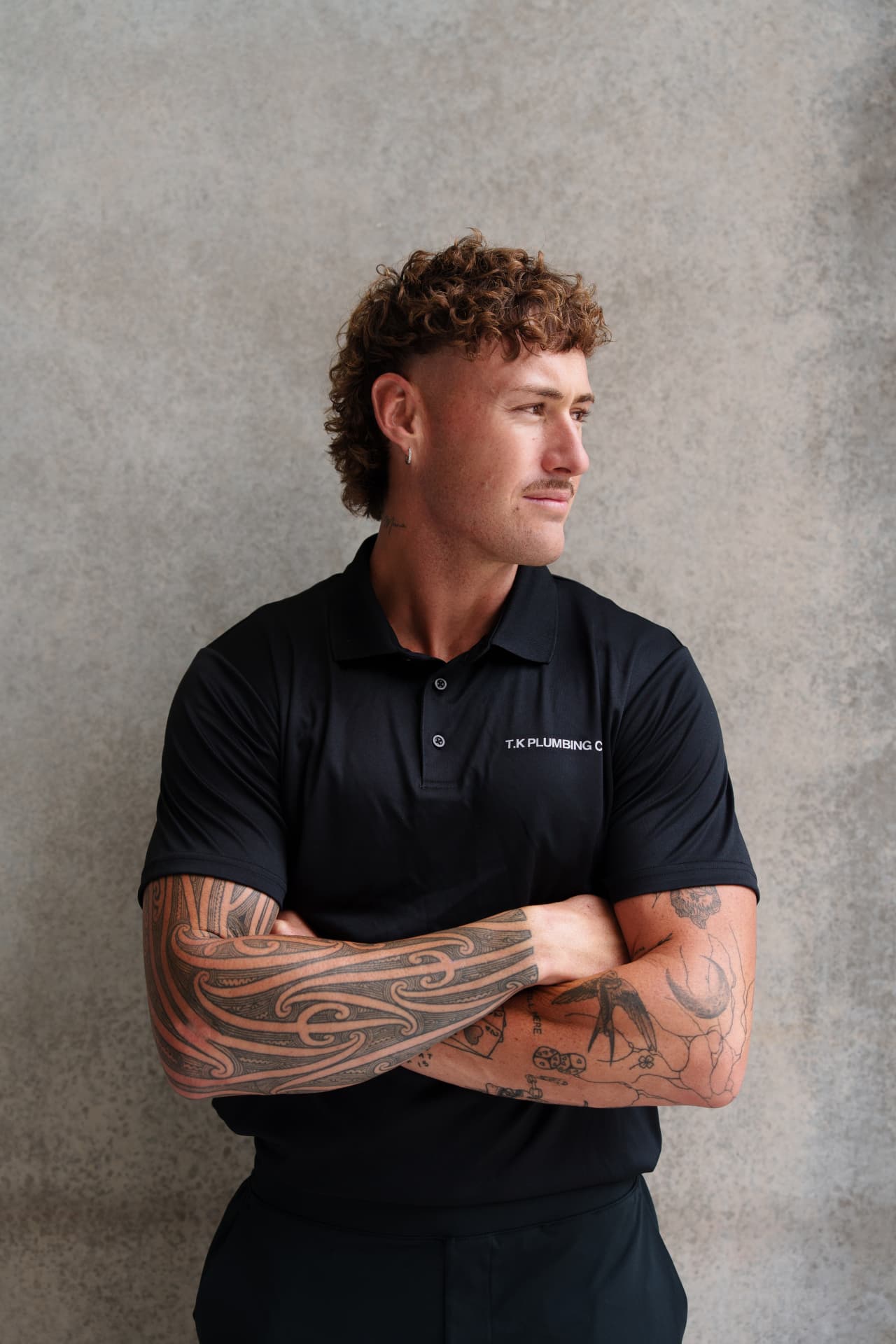 Tainui, owner and licensed Gold Coast plumber at TK Plumbing Co, on site